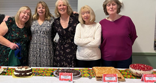 Volunteers at the Christmas Lunch dessert table